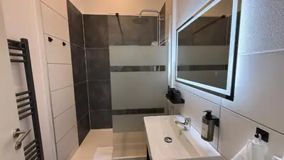 Ein Badezimmer in der Unterkunft Kings und Queens - 2SZ - Whirlpool - Terrasse - Grill