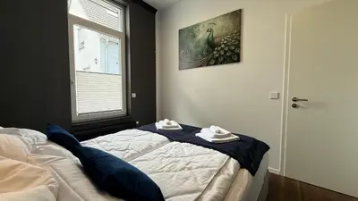 Ein Bett oder Betten in einem Zimmer der Unterkunft Kings und Queens - 2SZ - Whirlpool - Terrasse - Grill