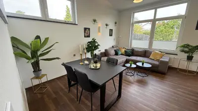 Ein Sitzbereich in der Unterkunft Kings und Queens - 2SZ - Whirlpool - Terrasse - Grill