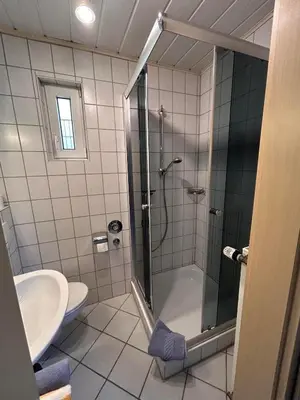 Ein Badezimmer in der Unterkunft Gästehaus Im Unnerdorf
