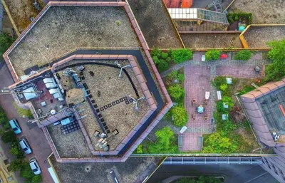 Blick auf Penthouse Apartment Zentral mit Goldstadtblick aus der Vogelperspektive