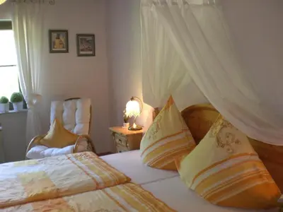 Ein Bett oder Betten in einem Zimmer der Unterkunft Ferienwohnung Meyerhöfer
