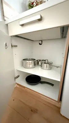 Küche/Küchenzeile in der Unterkunft Benmey Apartment Küche,TV,Waschmaschine