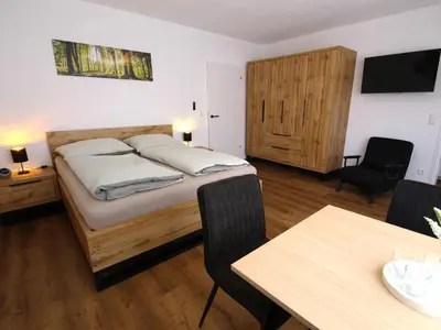 Ein Bett oder Betten in einem Zimmer der Unterkunft Apartment Rundum glücklich - Karlsruhe City