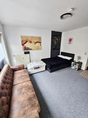 Ein Sitzbereich in der Unterkunft City Apartment