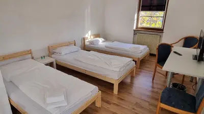 Ein Bett oder Betten in einem Zimmer der Unterkunft Hotel 3H Mannheim