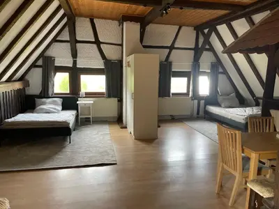 Ein Bett oder Betten in einem Zimmer der Unterkunft Hirschhaus