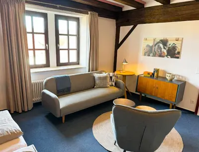 Ein Sitzbereich in der Unterkunft Herzogskelter Hotel & Restaurant