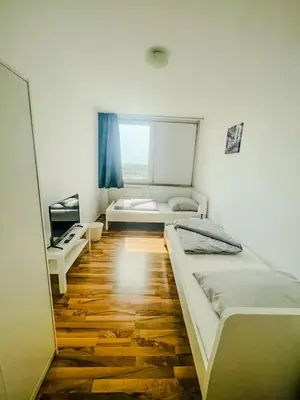 Ein Bett oder Betten in einem Zimmer der Unterkunft Nähe BASF- BG Klinik - MonteurzimmerFirstChoice
