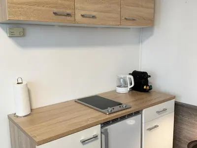 Küche/Küchenzeile in der Unterkunft Zentrale Studio Apartments