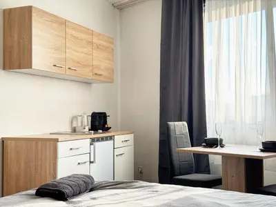 Küche/Küchenzeile in der Unterkunft Zentrale Studio Apartments