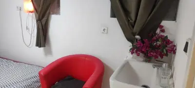 Ein Sitzbereich in der Unterkunft Zimmer 2 Phòng trọ trái chung nhau buồng tắm và nhà vệ sinh