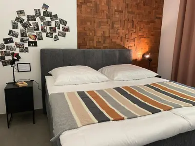 Ein Bett oder Betten in einem Zimmer der Unterkunft Ferienwohnung Nostalgic In der Nähe von Sinsheim Apartmenthaus Traudl