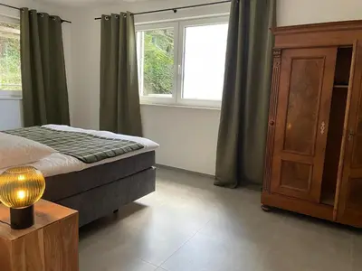 Ein Bett oder Betten in einem Zimmer der Unterkunft Ferienwohnung Nostalgic In der Nähe von Sinsheim Apartmenthaus Traudl