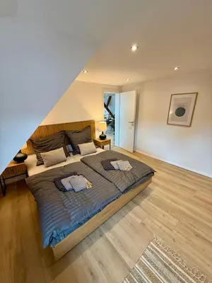 Ein Bett oder Betten in einem Zimmer der Unterkunft Lupi Blue - stylish und cosy Apartment