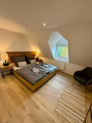 Ein Bett oder Betten in einem Zimmer der Unterkunft Lupi Blue - stylish und cosy Apartment