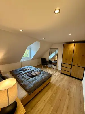 Ein Bett oder Betten in einem Zimmer der Unterkunft Lupi Blue - stylish und cosy Apartment