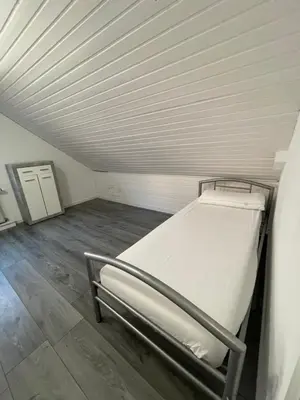 Ein Bett oder Betten in einem Zimmer der Unterkunft Ferienwohnung Panoramablick 1