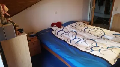Ein Bett oder Betten in einem Zimmer der Unterkunft HomeStay Sandra