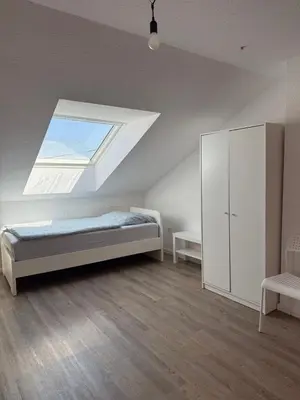 Ein Bett oder Betten in einem Zimmer der Unterkunft Monteurapartment und Ferienapartment Mannheim