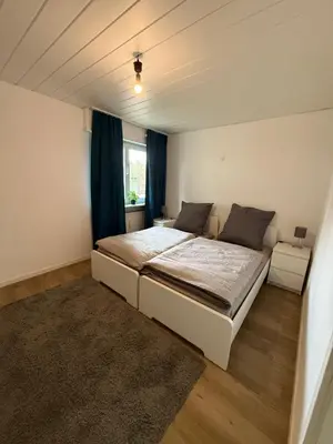 Ein Bett oder Betten in einem Zimmer der Unterkunft Heppenheim Monteurswohnung