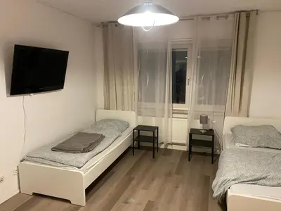 Ein Bett oder Betten in einem Zimmer der Unterkunft Monteur- und Ferienwohnung Mannheim