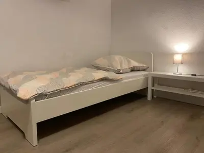 Ein Bett oder Betten in einem Zimmer der Unterkunft Monteur- und Ferienwohnung Mannheim
