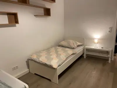 Ein Bett oder Betten in einem Zimmer der Unterkunft Monteur- und Ferienwohnung Mannheim