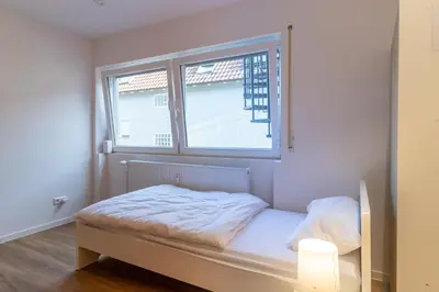 Ein Bett oder Betten in einem Zimmer der Unterkunft Haus Zehnfreunde