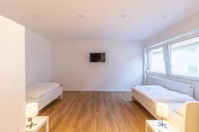 Ein Bett oder Betten in einem Zimmer der Unterkunft Haus Zehnfreunde