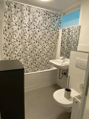 Ein Badezimmer in der Unterkunft 3-Zimmer Apartment mit Balkon
