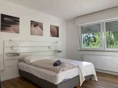 Ein Bett oder Betten in einem Zimmer der Unterkunft 3-Zimmer Apartment mit Balkon