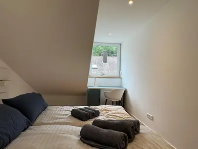 Ein Bett oder Betten in einem Zimmer der Unterkunft Nagoldblick 4 OG