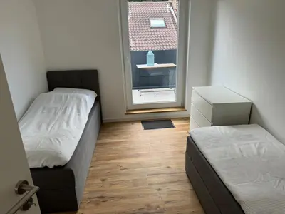 Ein Bett oder Betten in einem Zimmer der Unterkunft Nagoldblick 4 OG
