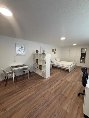 Ein Bett oder Betten in einem Zimmer der Unterkunft 1-Zimmer-Appartment ruhig & naturnah