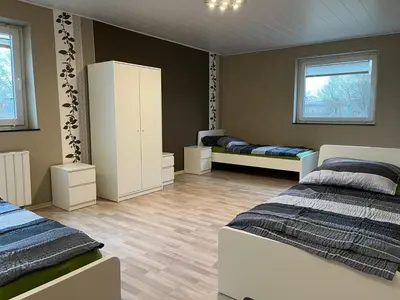 Ein Bett oder Betten in einem Zimmer der Unterkunft Apartment am Mainparksee