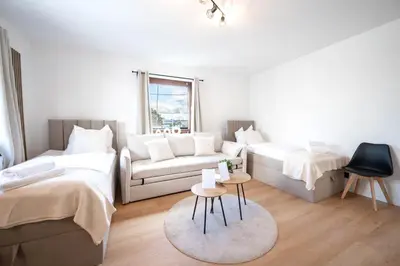 Ein Bett oder Betten in einem Zimmer der Unterkunft Malu Rooms - Attraktive Lage, Balkon, SmartTv, 24h Checkin, Waschmaschine,