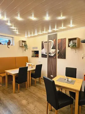 Ein Sitzbereich in der Unterkunft Kleines Landhaus Wendel