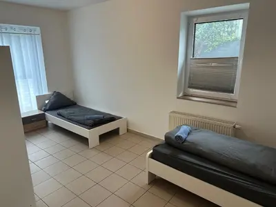 Ein Sitzbereich in der Unterkunft 3 Schlafzimmer, Wohnzimmer, Küche, Bad, Terrasse, Parkplatz