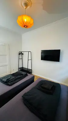 Ein Bett oder Betten in einem Zimmer der Unterkunft 3-room apartment with parking space Sleepomat