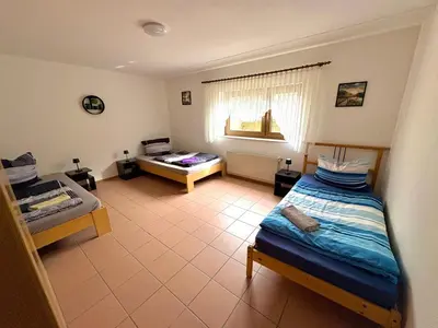Ein Bett oder Betten in einem Zimmer der Unterkunft Ferienwohnung in Bad Schönborn