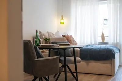 Ein Sitzbereich in der Unterkunft Goldstadt Mosaik Apartment