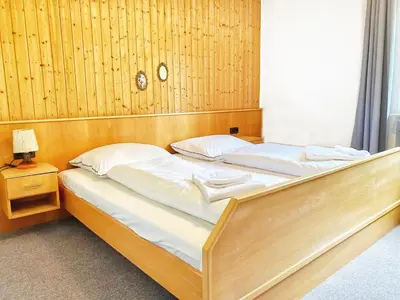 Ein Bett oder Betten in einem Zimmer der Unterkunft Zum Goldenen Löwen