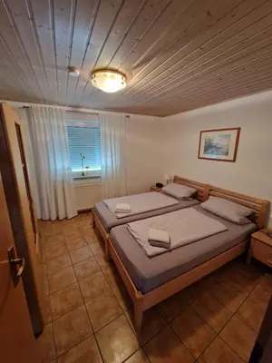 Ein Bett oder Betten in einem Zimmer der Unterkunft Gemütliche und gepflegte Ferienwohnung in Bad Wimpfen