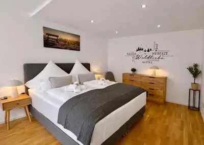 Ein Bett oder Betten in einem Zimmer der Unterkunft WINETIME - Apartment Sankt Martin für 2 Personen im Zentrum Luftkurort an der südlichen Weinstraße zwischen Neustadt und Landau