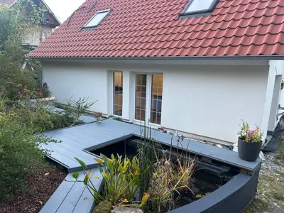 Ein Garten an der Unterkunft das HAUS