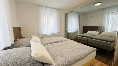 Ein Bett oder Betten in einem Zimmer der Unterkunft 2-Zimmer-Wohnung-Küche-Bad-Terrasse, Bahnhofsnähe