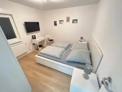 Ein Bett oder Betten in einem Zimmer der Unterkunft L8 Street - Mönsheim