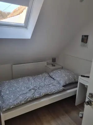 Ein Bett oder Betten in einem Zimmer der Unterkunft L8 Street - Mönsheim