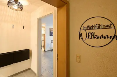 Ein Zertifikat, Auszeichnung, Logo oder anderes Dokument, das in der Unterkunft Wohlfühlnest St Leon Rot Aufzug Klima Balkon ausgestellt ist